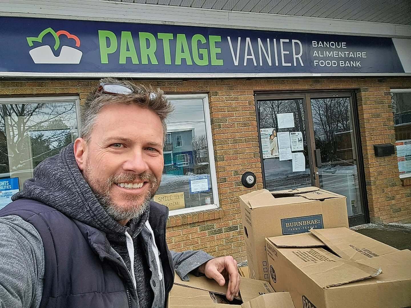 Gopher It supporting Partage Vanier Food Bank with a delivery of donated food